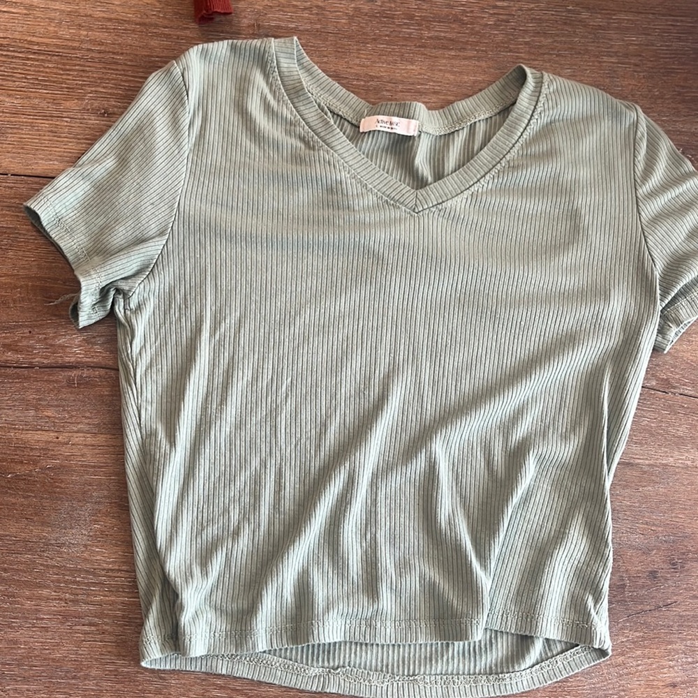 light green slightly cropped fitted t shirt